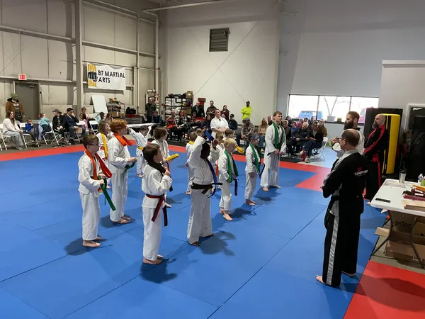 Youth students lined up in formation during belt testing